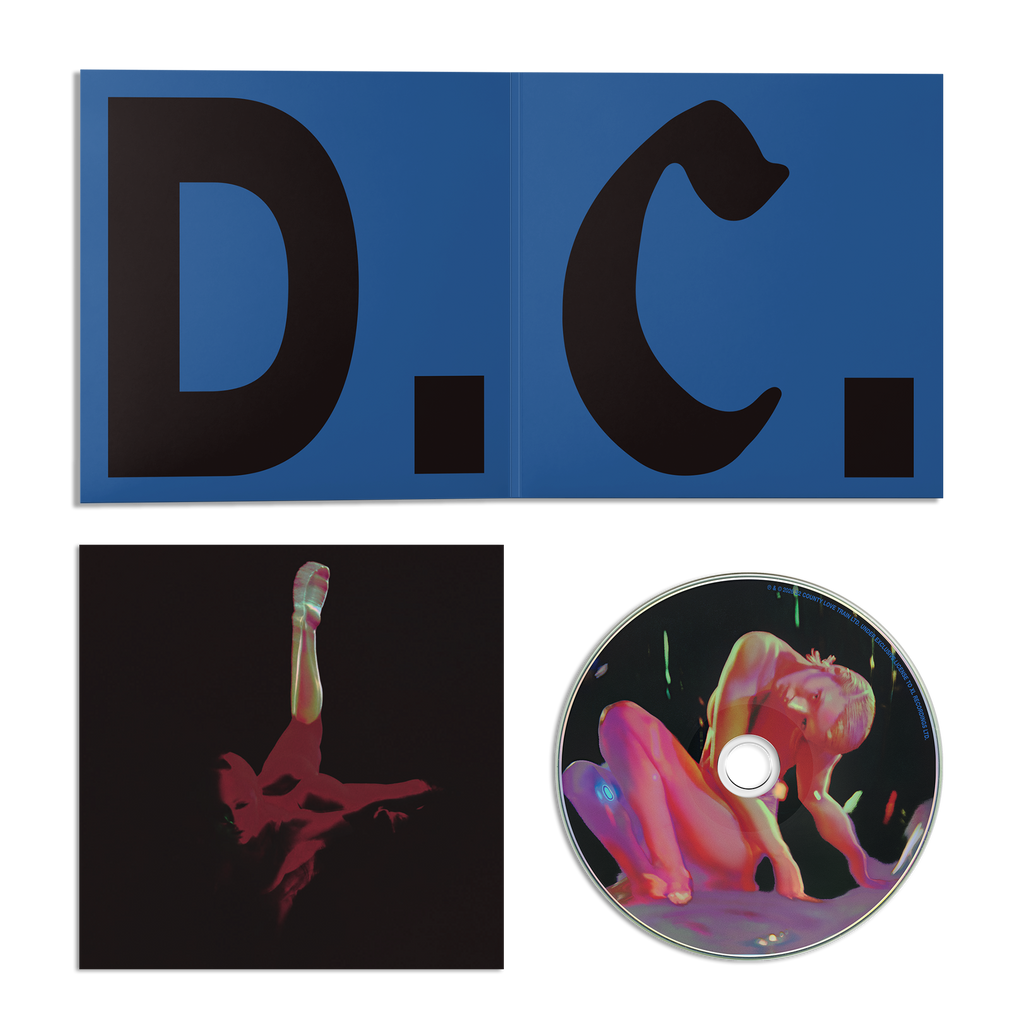 Blue 'D.C.' CD insert, print with red distorted graphic, and CD with a neon artwork. 