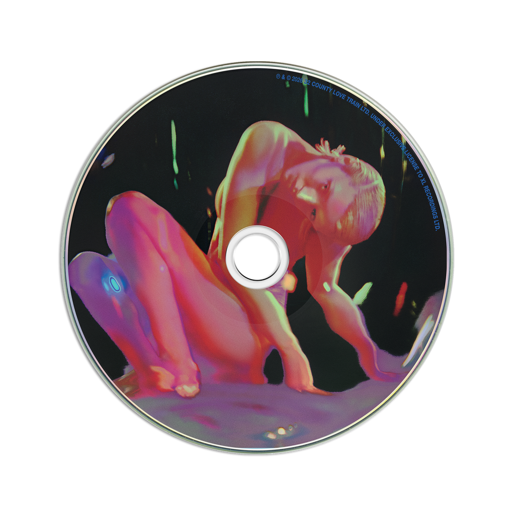 A disc with printed cover art featuring a stylized nude figure in pink and purple tones against a dark background.