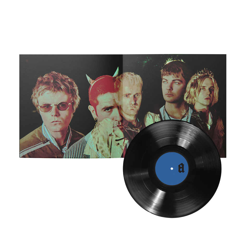 A vinyl record partially pulled from its open sleeve, showing a portrait cover and a black record with a blue center label.
