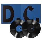 Two black vinyl records displayed in front of an open blue "D.C." insert. 