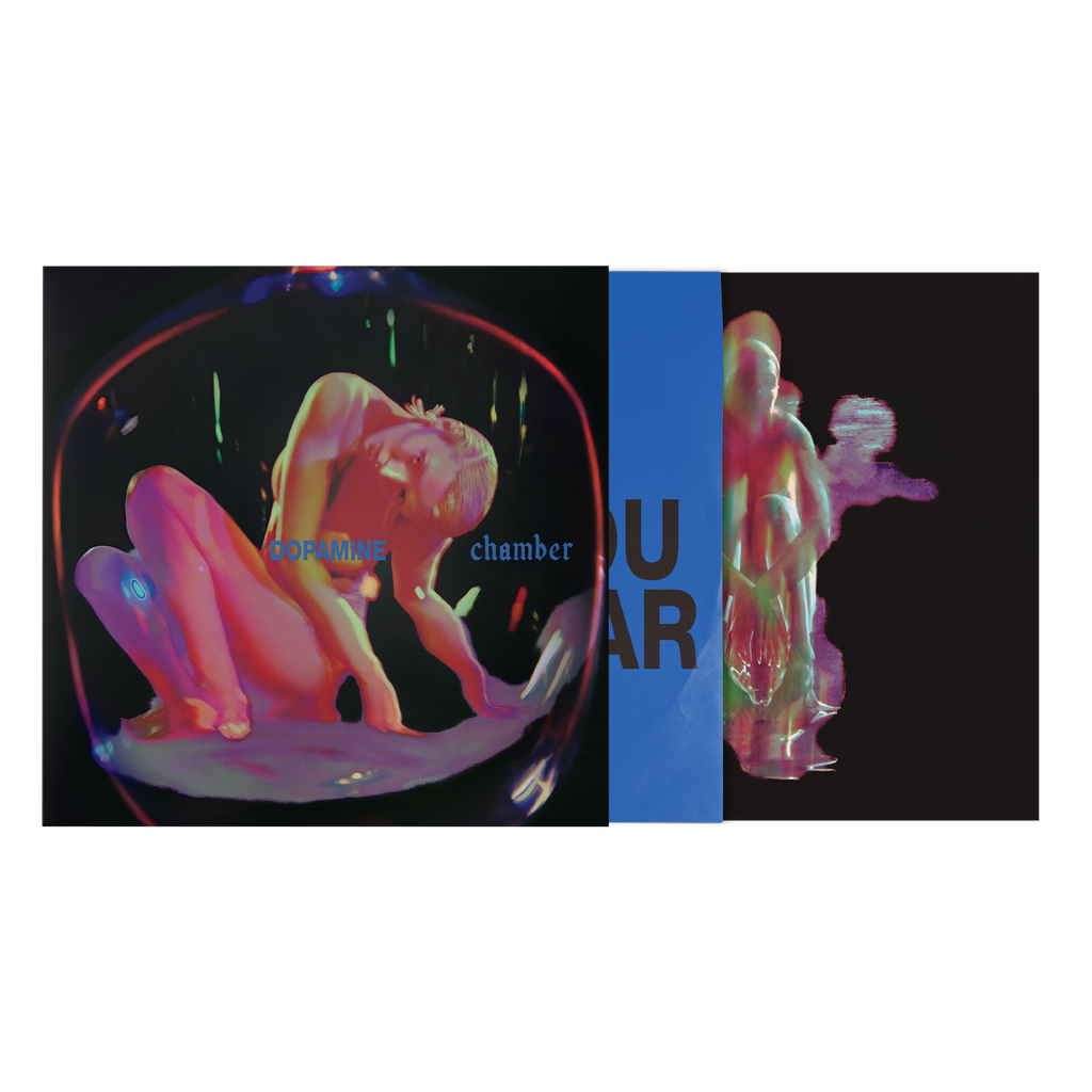 Vinyl cover with neon colorful graphic of a female on a black background with bright blue inner sleeve with bold black text. 